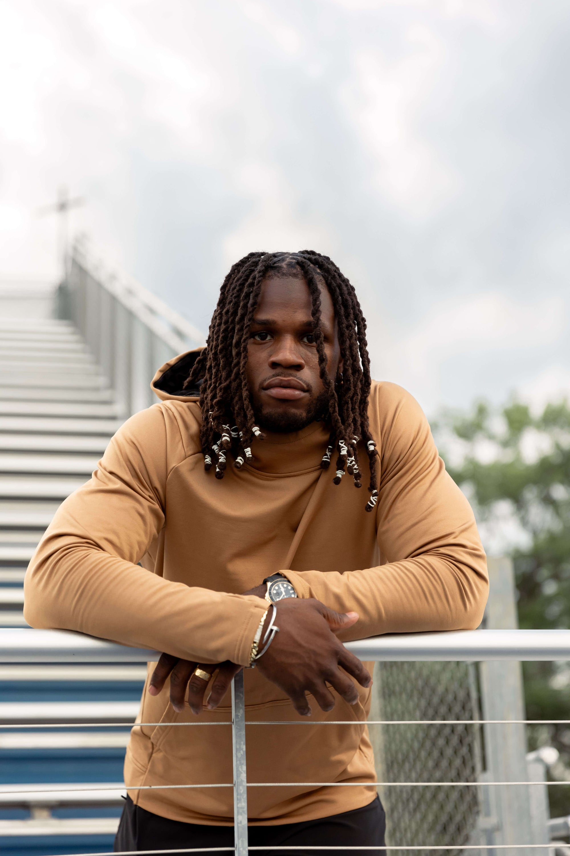 Josh Metellus on bleachers